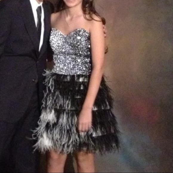 Terani couture feather dress